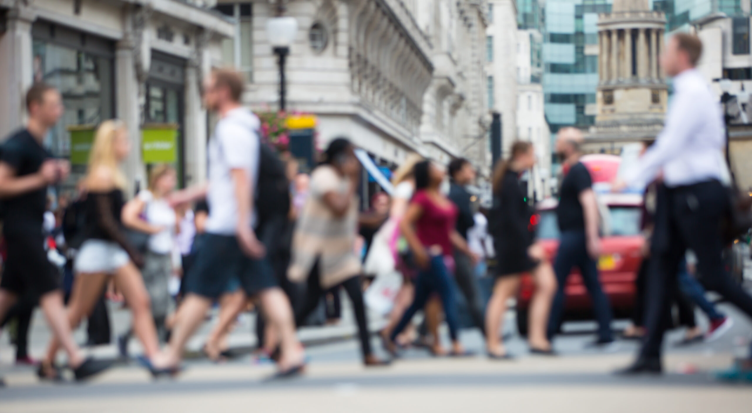 regent,street,with,lots,of,walking,people,crossing,the,road.